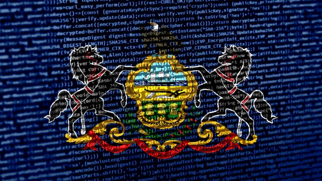 The flag of Pennsylvania here floats over over digital code, highlighting the concepts of AI and and digital infrastructure innovation within the state, which has become a burgeoning hot spot for hyperscale data center development.