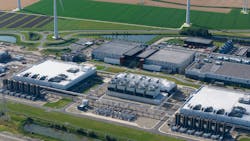 Aerial view of major hyperscale data center in Eemshaven, Groningen, The Netherlands. Aerial view of major hyperscale data center in Eemshaven, Groningen, The Netherlands.