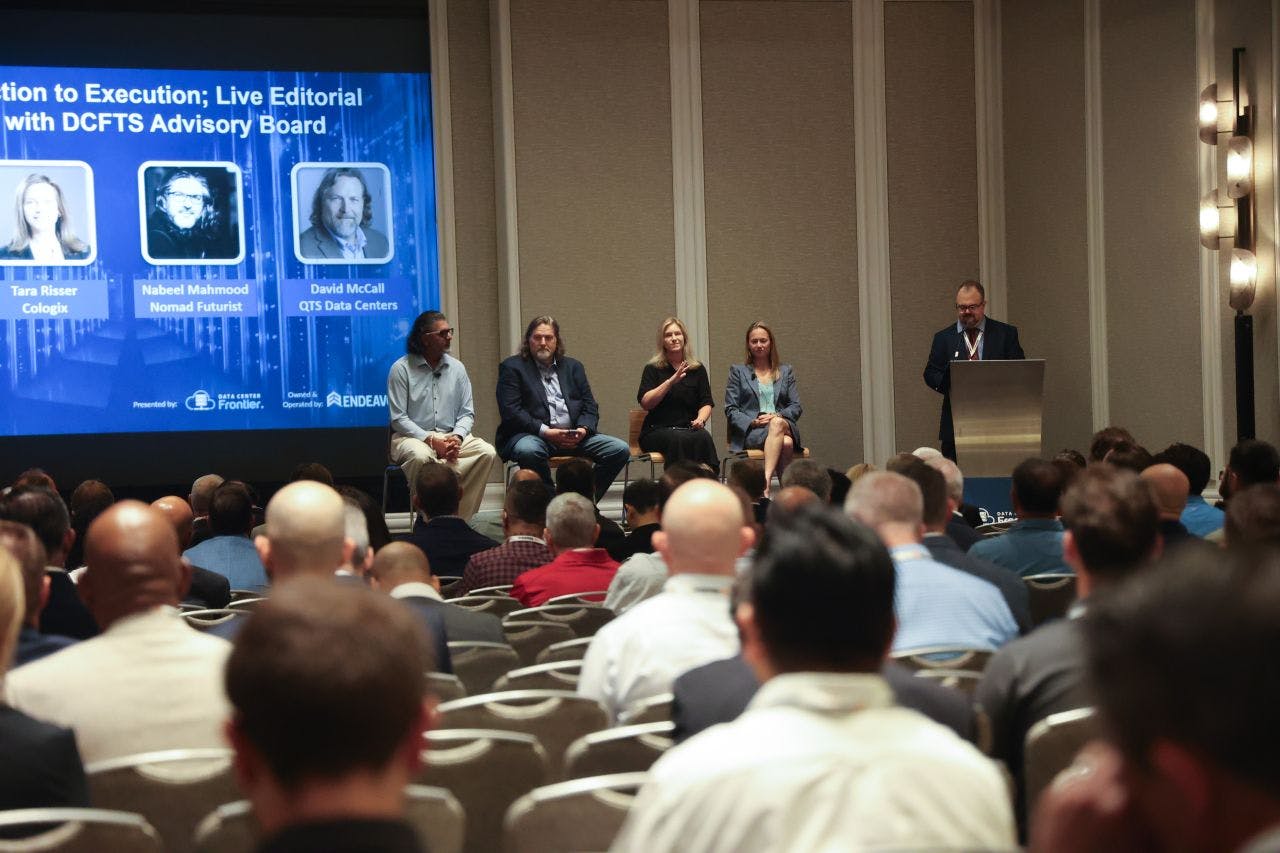 From left: Nabeel Mahmood, Managing Director, Nomad Futurist; David McCall, Brand Evangelist, QTS Data Centers; Tara Risser, Chief Business Officer, Cologix; Karen Petersburg, SVP of Design & Engineering, AREP/PowerHouse; and Matt Vincent, Editor-in-Chief, Head of Content, Data Center Frontier/EndeavorB2B, during the opening session of the 2026 Data Center Frontier Trends Summit in Reston, Virginia. &ldquo;From Projection to Execution&rdquo; opened the conference with a live editorial roll call from DCF Advisory Board members on what has changed in the past year&mdash;and where power, capital, labor and community constraints are accelerating or slowing the delivery of new data center infrastructure.
