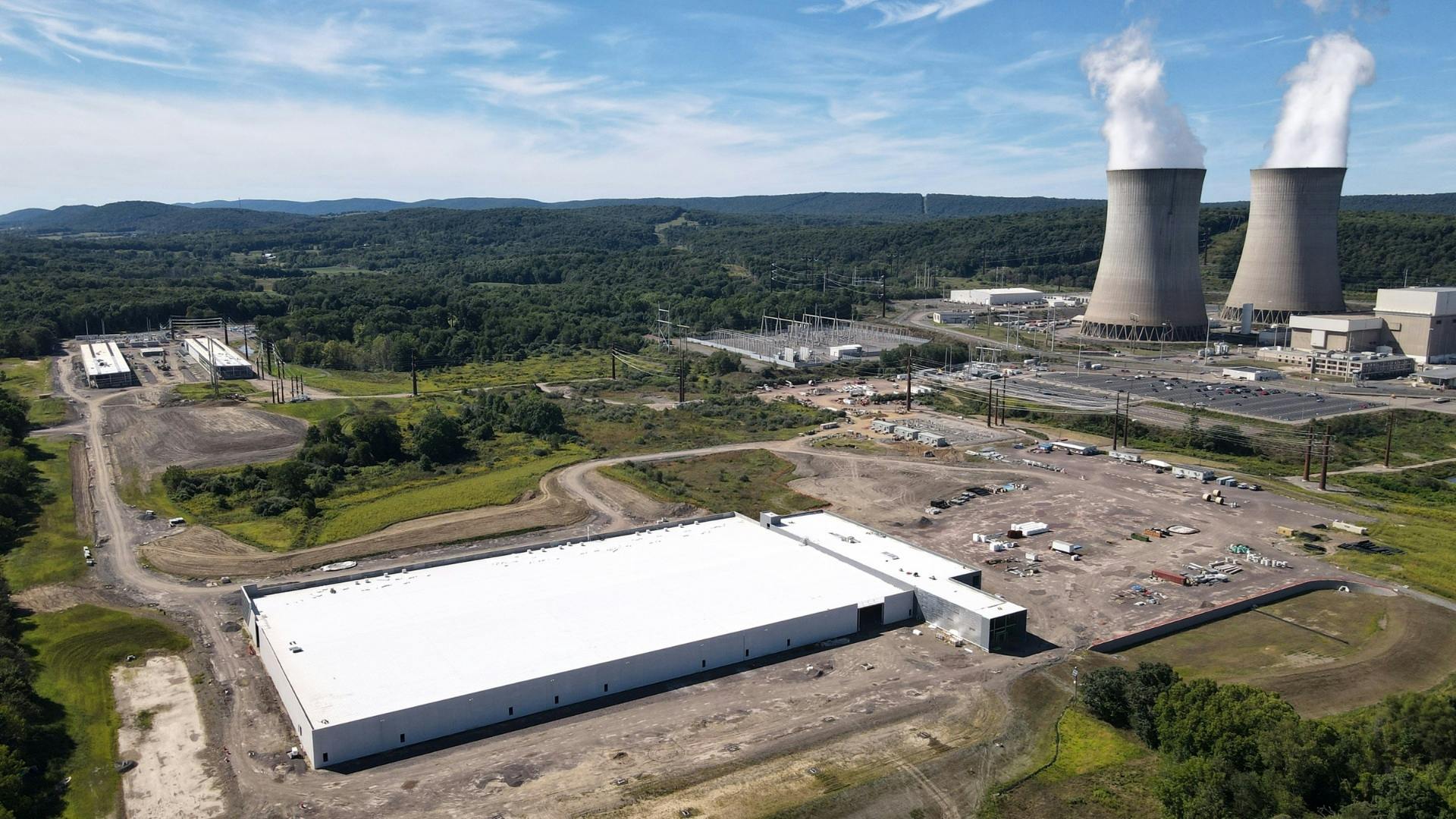 Amazon Web Services&rsquo; data center campus sits adjacent to Talen Energy&rsquo;s Susquehanna nuclear power plant in Salem Township, Pennsylvania, where co-located generation has become a test case for how large data center loads should interact with the regional grid.