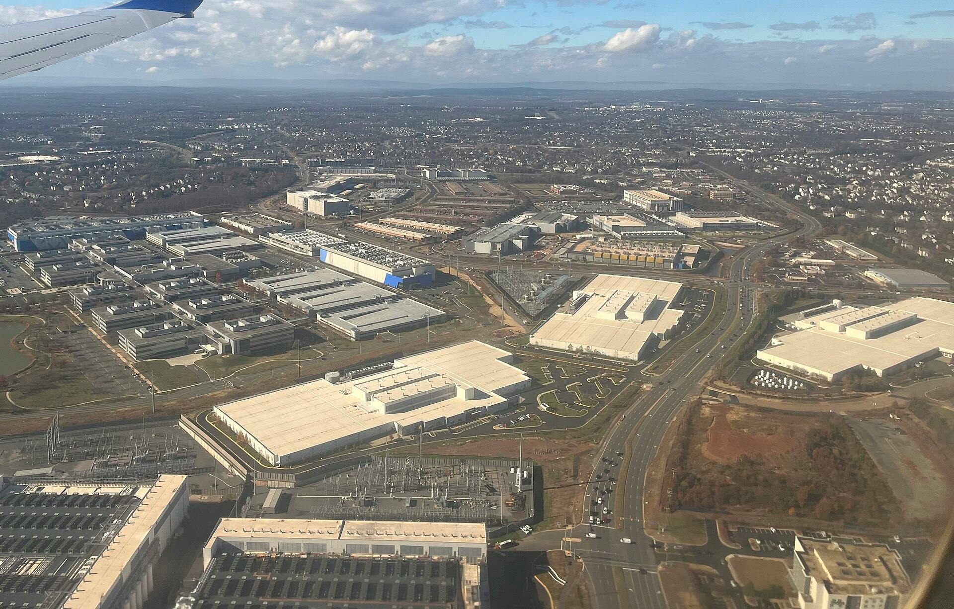 November 2025 aerial view of data centers intermingled with other commercial buildings in Loudoun County, near Ashburn.